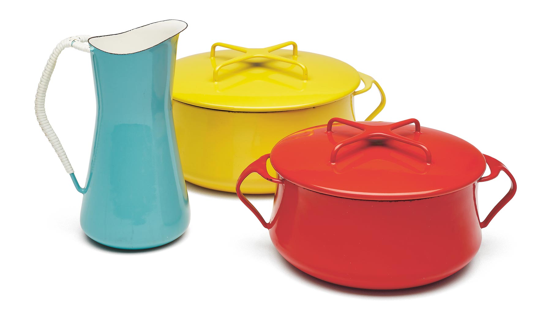 Teal blue pitcher with a yellow and red casserole dish