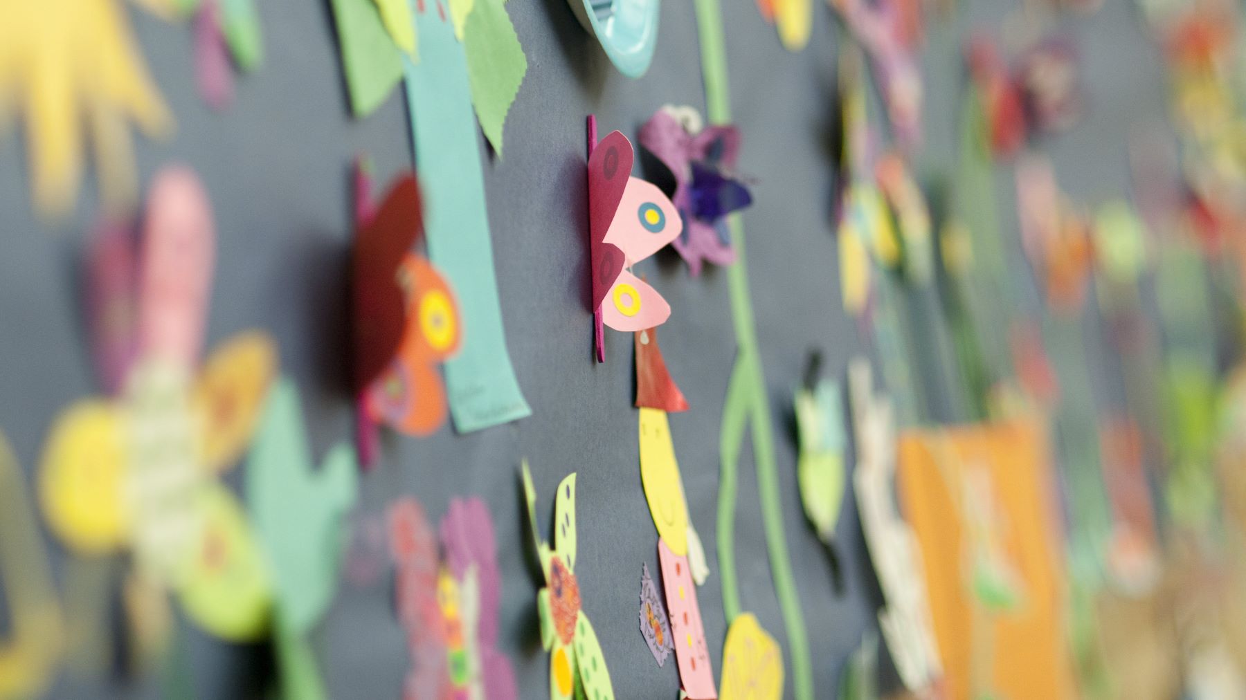 Paper flowers displayed in the Kohl's Art Studio