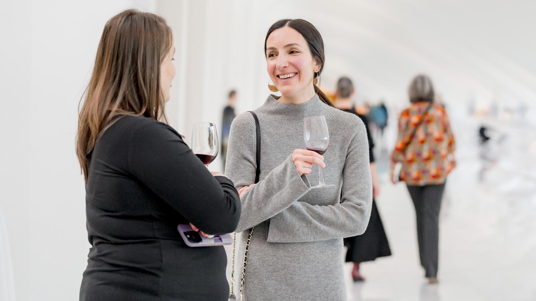 Two women talking in the galleries