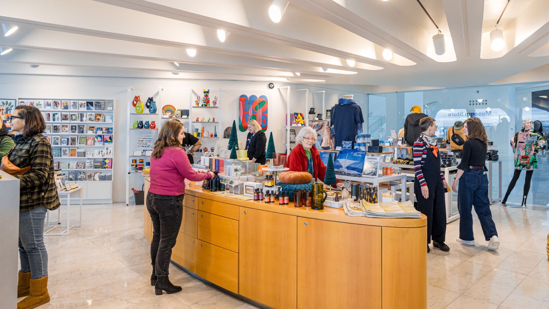 People shopping in the Milwaukee Art Museum Store