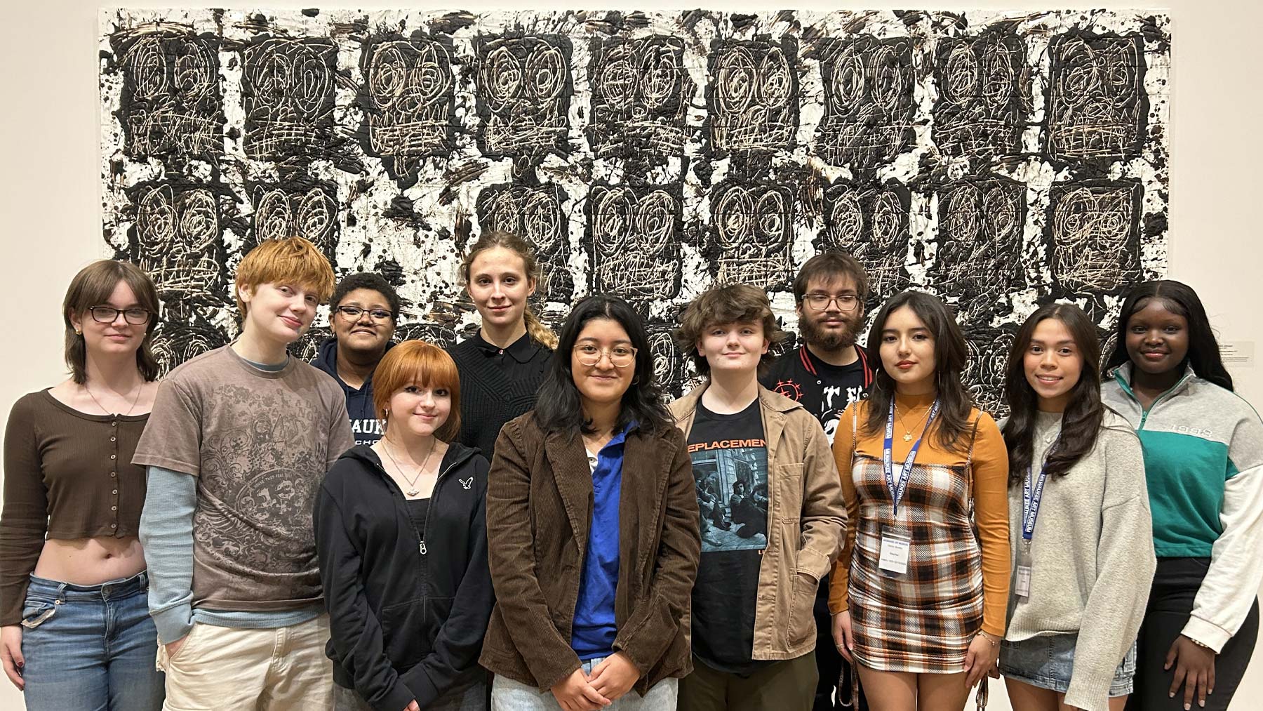 Group of teenagers posing in front of Untitled Anxious Audience