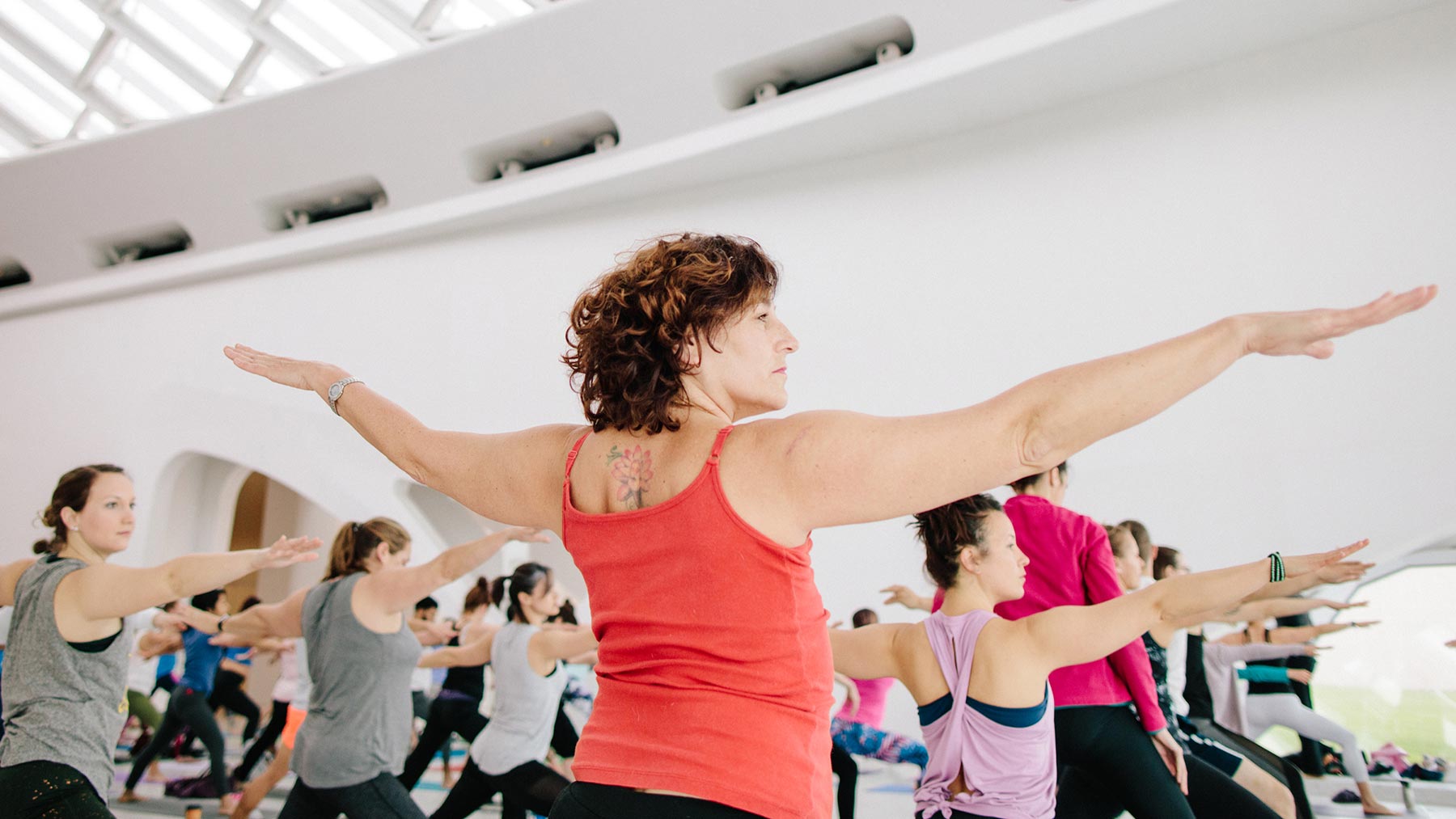 Group of women doing yoga at the Museum