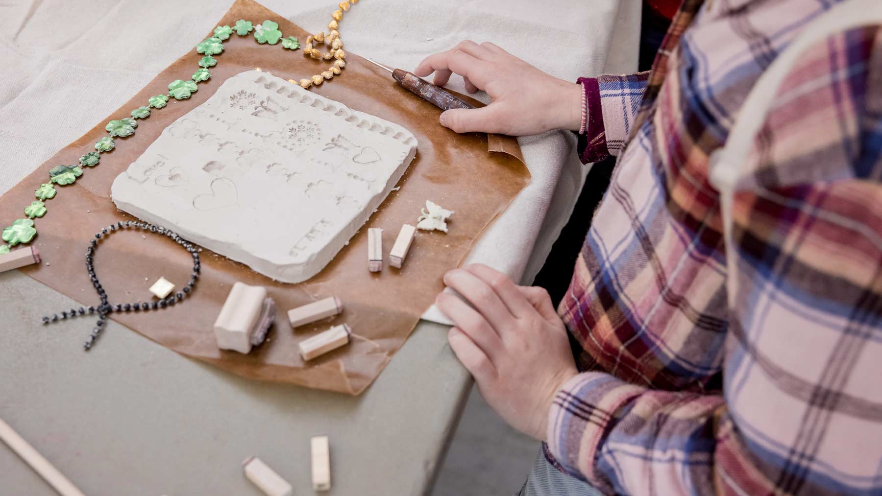 Girl making clay art