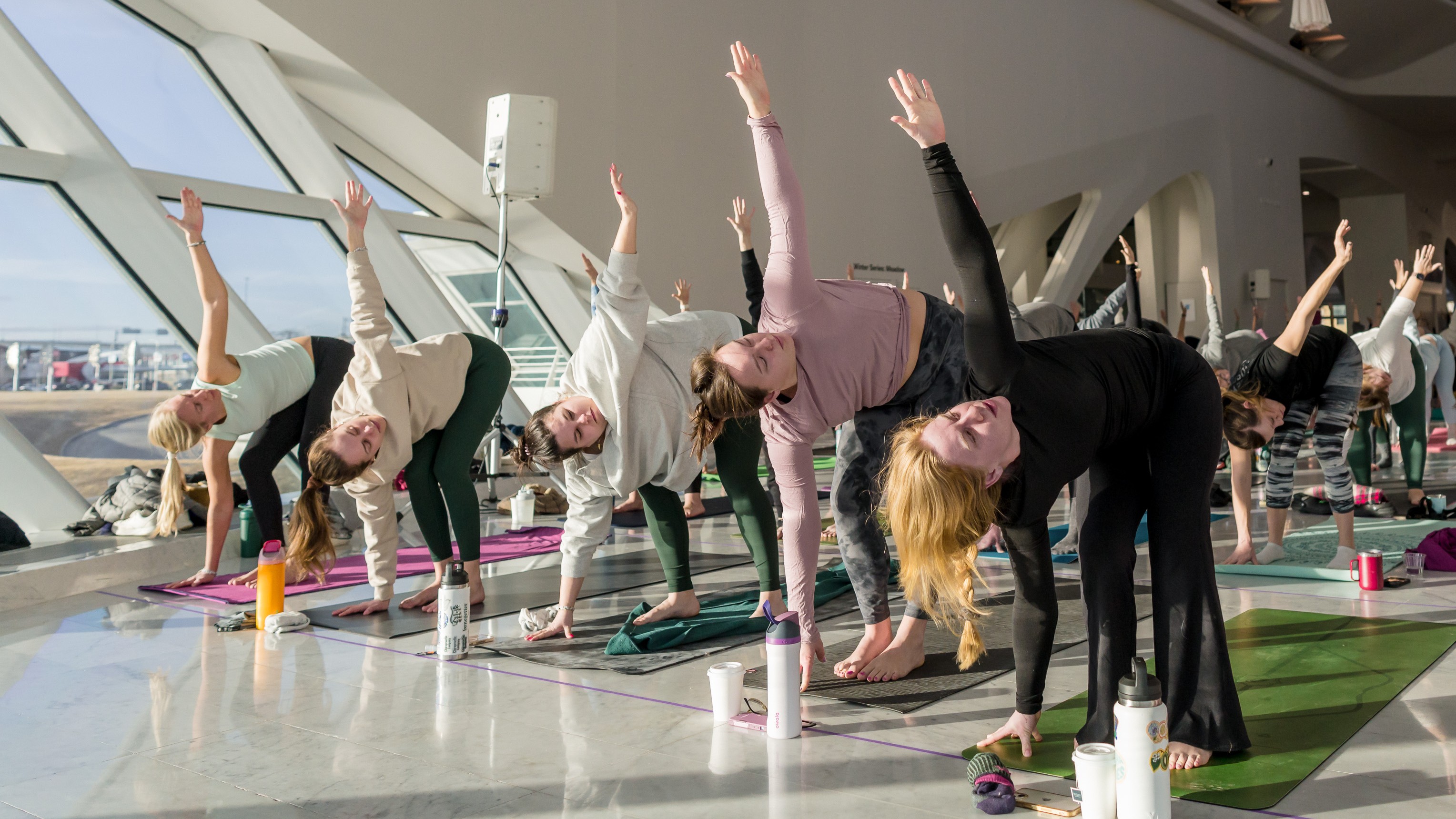 People practicing yoga in the Milwaukee Art Museum