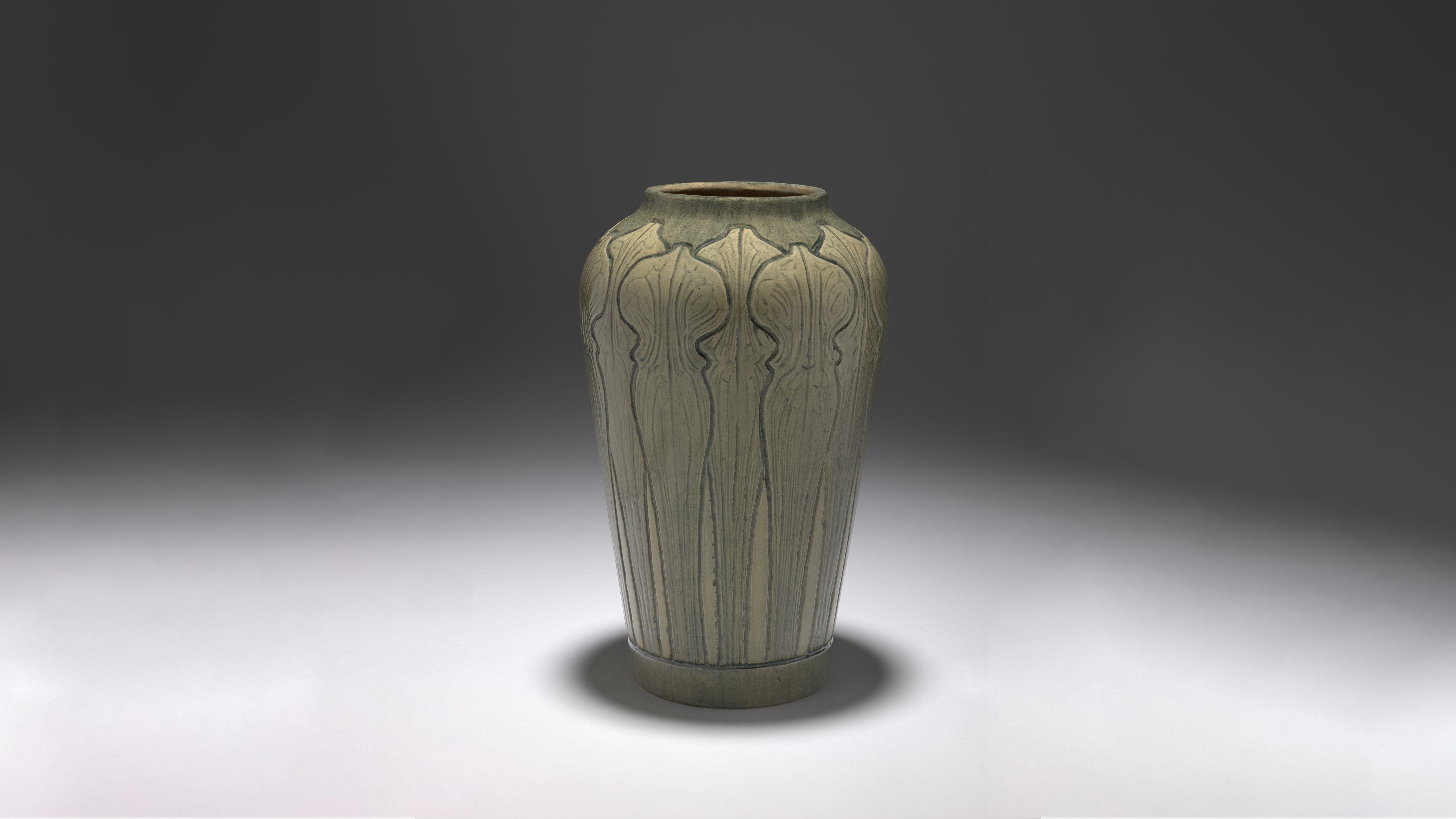 Beige vase on grey background