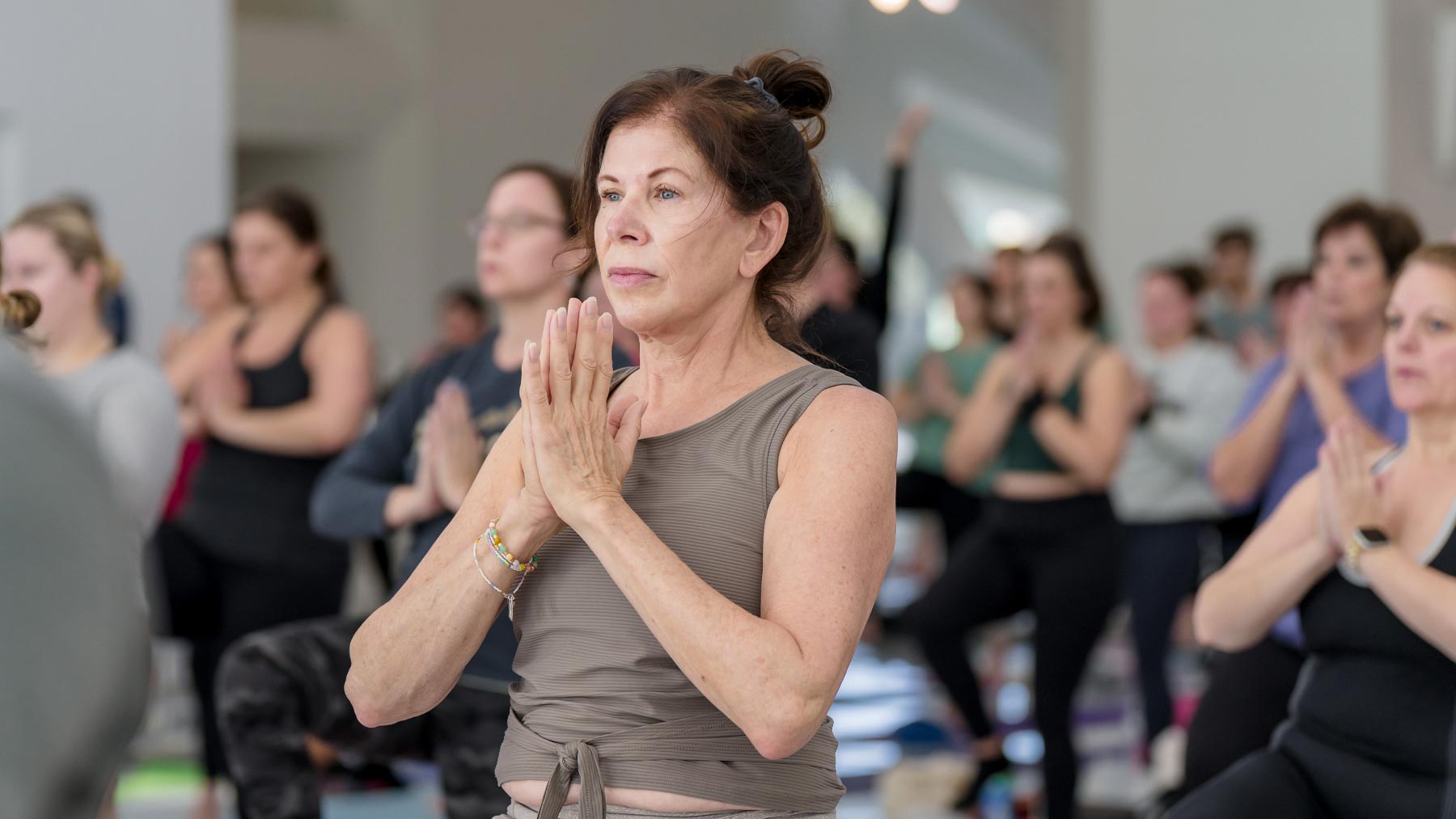 People doing yoga in Windhover Hall