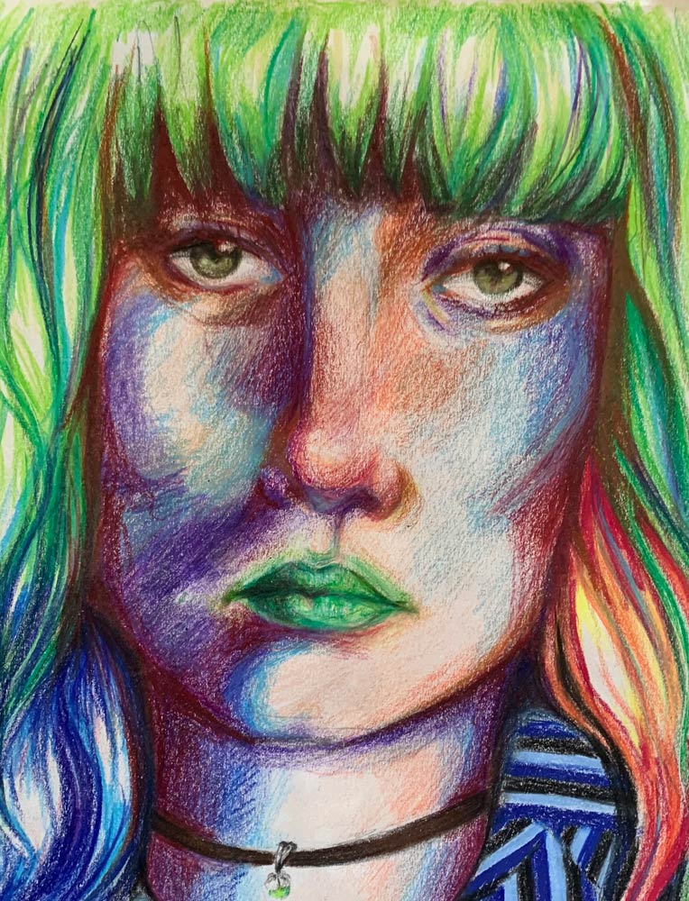 Portrait of a young woman with green and multi-colored hair