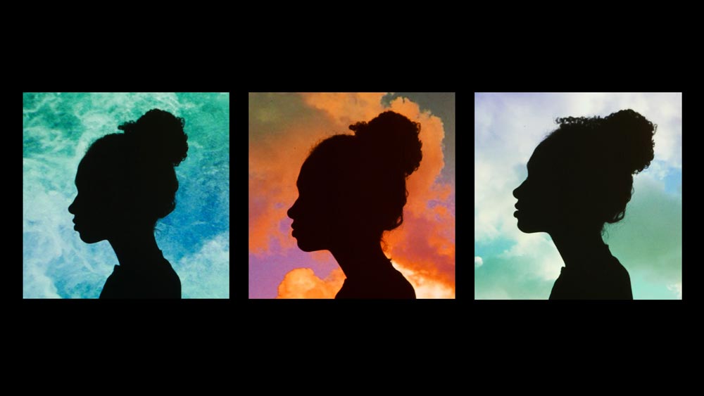 Three panes lined horizontally with the silhouette of a woman, one with a water background, one with a sunset and clouds background, and one with a blue sky with clouds background