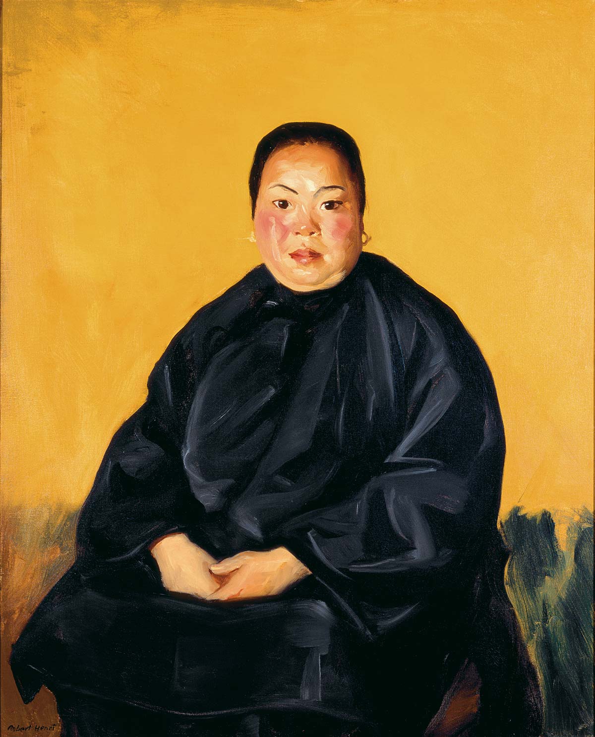 Chinese woman posing in a black oversized shirt