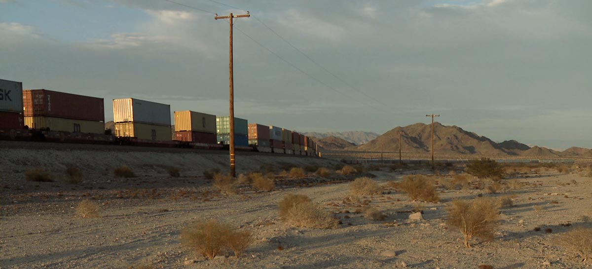 Cargo train moving through the desert