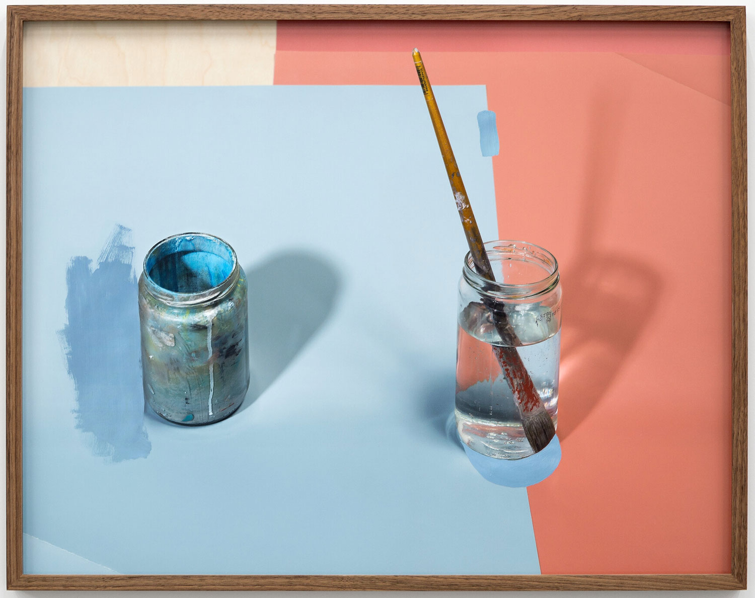 Glass of water with paintbrush next to a painting of a jar covered in paint