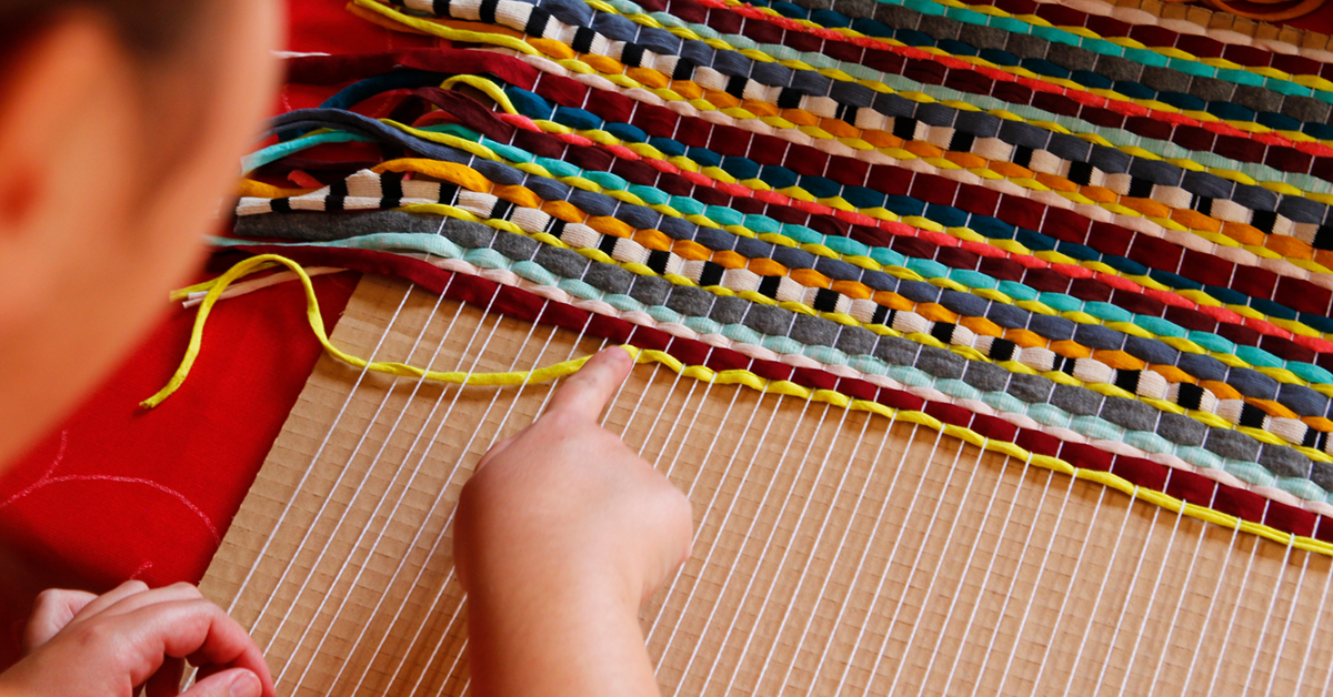 Photo of child weaving