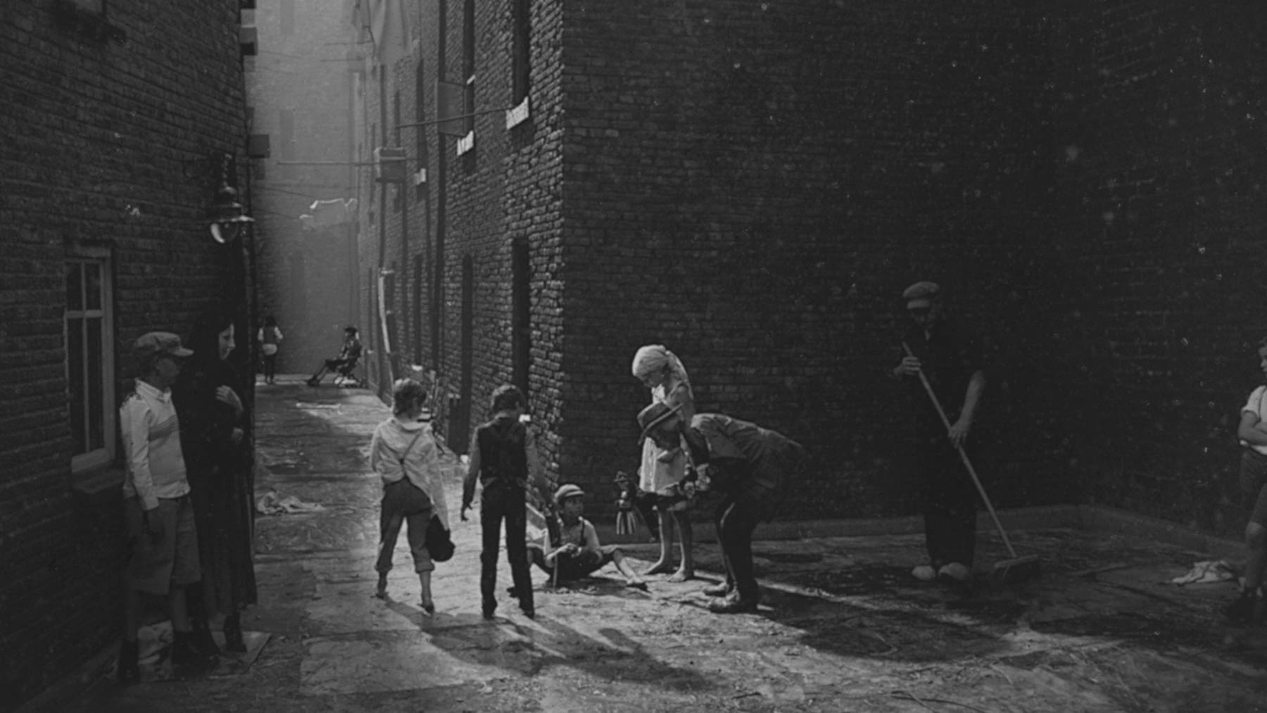 Group of young children in an alleyway