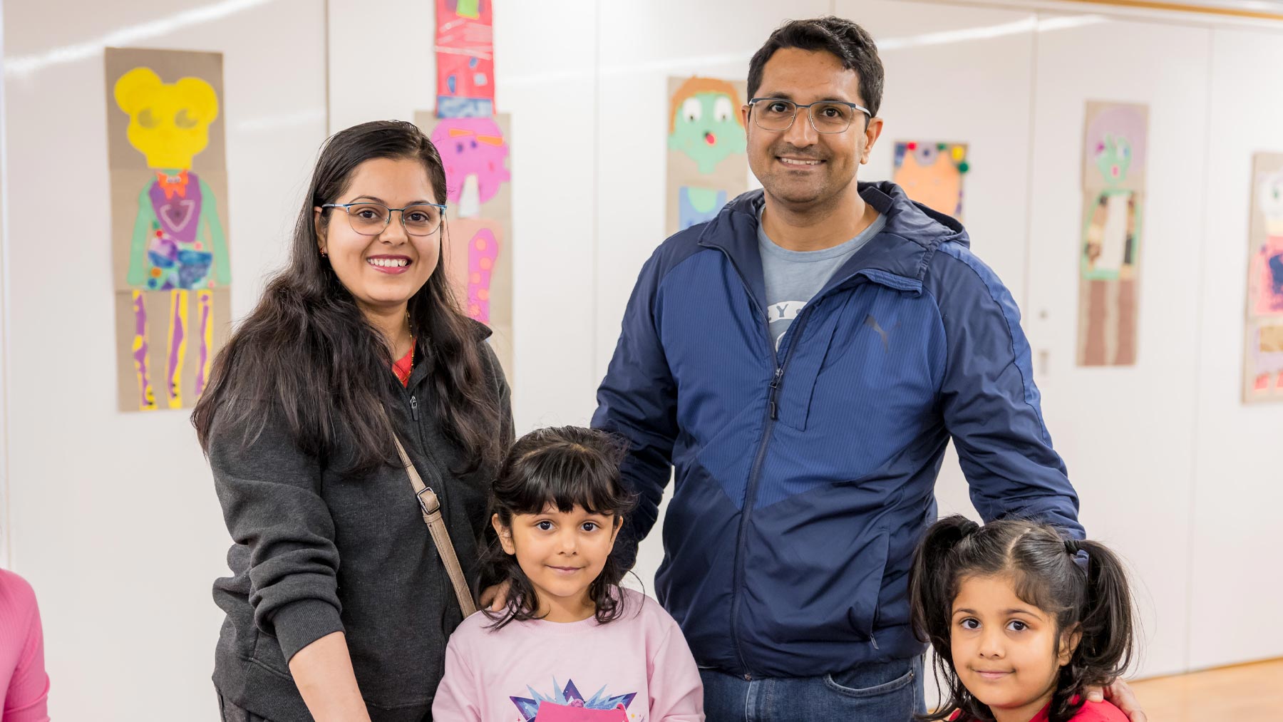 Parents with their two young children
